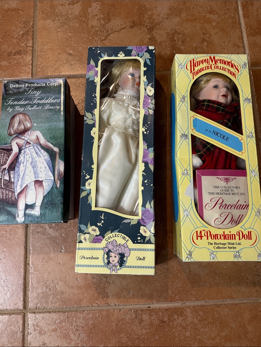 Porcelain Doll Trio in Original Boxes - Cream, Red, Black